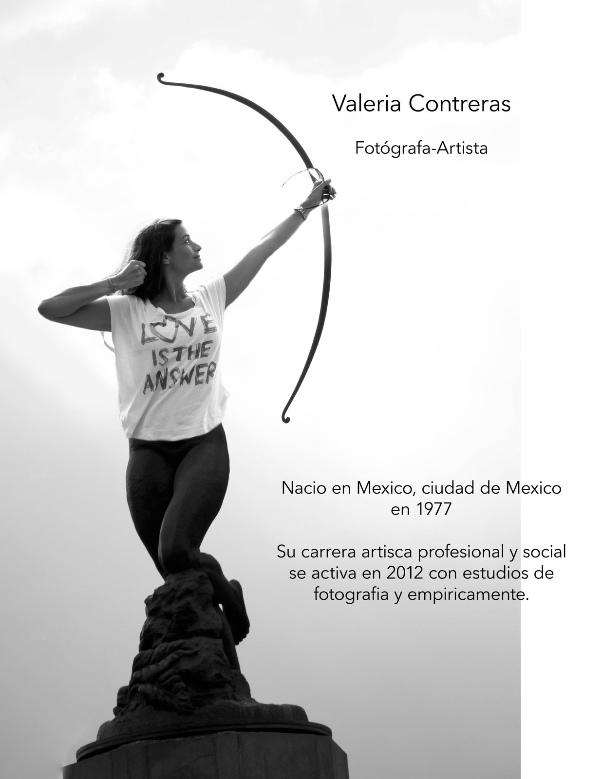 Portrait of Valeria Contreras standing in a black dress against a warm-toned studio backdrop.