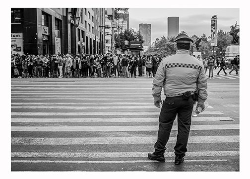 Photograph from Valeria Contreras’s México series titled Policía de Espalda.
